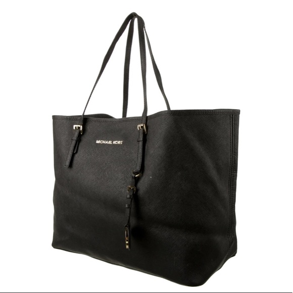 Black leather Michael Kors tote bag with gold-toned accents and flat handles. - Picture 3 of 12